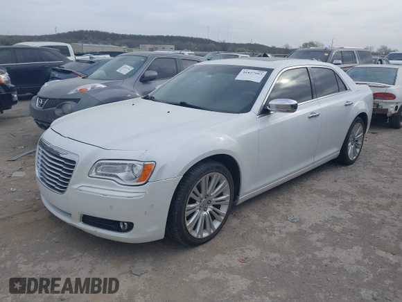 2012 Chrysler 300 with VIN 2C3CCAET1CH253300, listed as a IAAI auction lot 41827997 with 193,298 mi miles. Bid and sale history available at carsss.com. Image 2.
