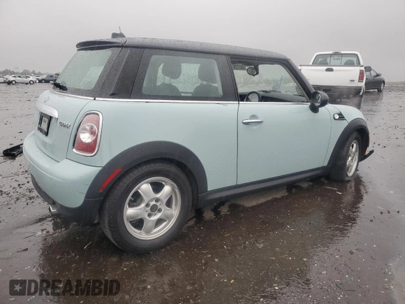 2011 MINI Hardtop with VIN WMWSU3C57BT096973, listed as a Copart auction lot 52726185 with 90,545 mi miles and Salvage title. Bid and sale history available at DreamBid. Image 3.