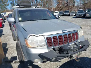 2009 Jeep Grand Cherokee with VIN 1J8HR68T39C540795, listed as a IAAI auction lot 41379112 with 236,624 mi miles and . Bid and sale history available at DreamBid. Image 1.