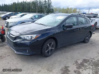 2023 Subaru Impreza Premium with VIN 4S3GTAV69P3714999, listed as a IAAI auction lot 41971558 with 31,804 mi miles. Bid and sale history available at carsss.com. Image 2.