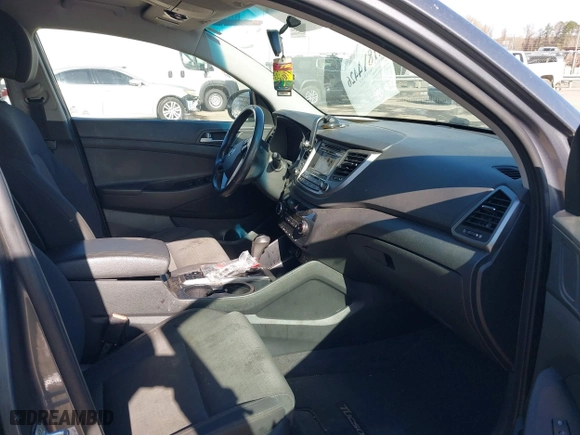 2017 Hyundai Tucson Value with VIN KM8J33A25HU402366, listed as a IAAI auction lot 41814426 with 117,669 mi miles. Bid and sale history available at carsss.com. Image 5.