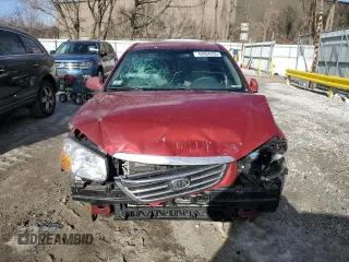 2009 Kia Spectra SX with VIN KNAFE222495661159, listed as a Copart auction lot 42604295 with 123,934 mi miles and Salvage Title. Bid and sale history available at carsss.com. Image 5.