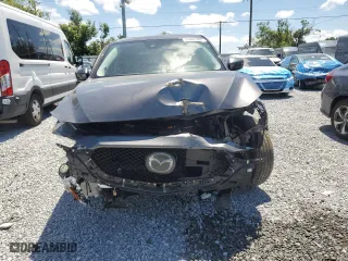 2021 Mazda CX-5 Grand Touring with VIN JM3KFADMXM1300565, listed as a Copart auction lot 53003705 with 40,911 mi miles and Non Repairable. Bid and sale history available at carsss.com. Image 5.