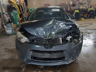2016 Toyota Corolla L with VIN 5YFBURHE1GP441833, listed as a IAAI auction lot 41857006 with 179,899 mi miles. Bid and sale history available at carsss.com. Image 6.