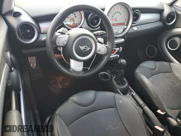 2009 MINI Hardtop S with VIN WMWMF73569TW87834, listed as a Copart auction lot 60362395 with 52,448 mi miles and Salvage title. Bid and sale history available at DreamBid. Image 8.