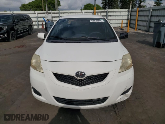 2012 Toyota Yaris z VIN JTDBT4K35CL017457, wystawiony jako Copart lot #58820985 z przebiegiem 120 901 mil mil oraz Szkoda całkowita • Salvage title. Historia ofert i sprzedaży dostępna na DreamBid. Obrazek 5.