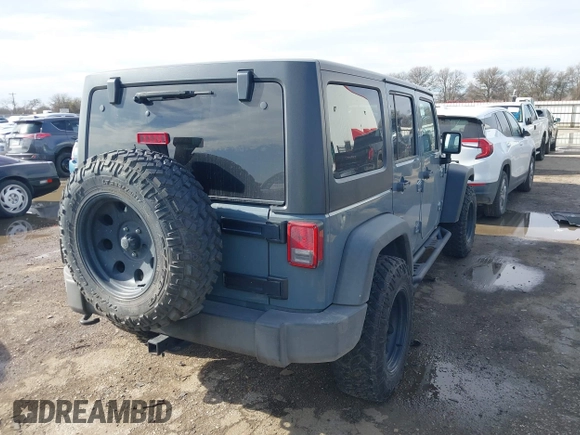 2014 Jeep Wrangler Unlimited Sport with VIN 1C4BJWDG9EL309763, listed as a IAAI auction lot 41378132 with 117,029 mi miles. Bid and sale history available at carsss.com. Image 4.