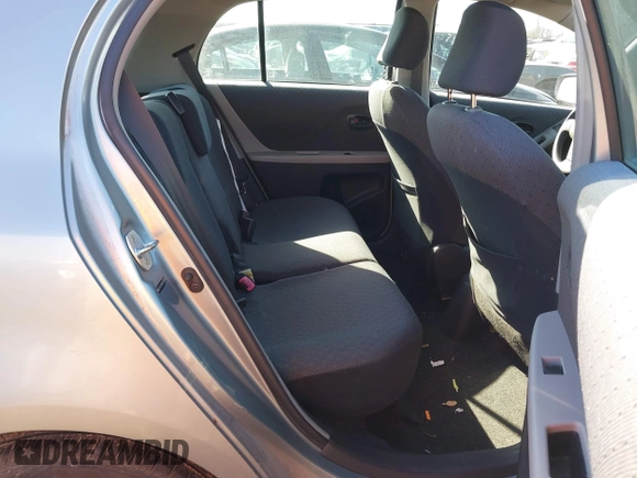 2010 Toyota Yaris with VIN JTDKT4K38A5285260, listed as a IAAI auction lot 41476373 with 104,358 mi miles. Bid and sale history available at carsss.com. Image 8.