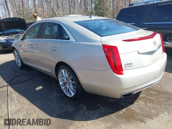 2013 Cadillac XTS Platinum z VIN 2G61U5S37D9209926, wystawiony jako IAAI lot #41754716 z przebiegiem 126 239 mil mil oraz . Historia ofert i sprzedaży dostępna na DreamBid. Obrazek 3.