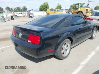 2007 Ford Mustang Deluxe with VIN 1ZVFT80N675254270, listed as a IAAI auction lot 42142385 with 182,962 mi miles. Bid and sale history available at carsss.com. Image 4.