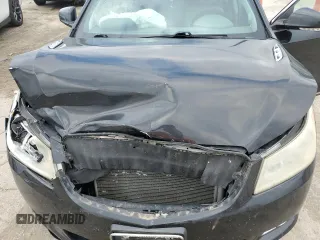 2012 Buick LaCrosse Premium 1 z VIN 1G4GD5E39CF131556, wystawiony jako Copart lot #55774885 z przebiegiem 143 129 mil mil oraz Szkoda całkowita • Salvage title. Historia ofert i sprzedaży dostępna na DreamBid. Obrazek 11.