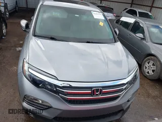 2016 Honda Pilot EX-L with VIN 5FNYF5H53GB040003, listed as a IAAI auction lot 41452374 with Not Provided miles and . Bid and sale history available at DreamBid. Image 11.