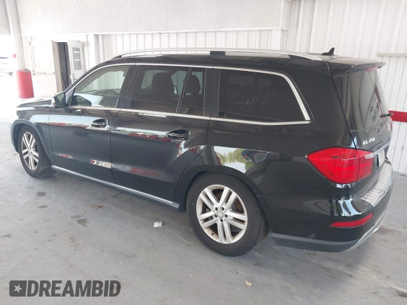 2014 Mercedes-Benz GL 450 z VIN 4JGDF7CE7EA435479, wystawiony jako IAAI lot #42280243 z przebiegiem 138 930 mil mil oraz . Historia ofert i sprzedaży dostępna na DreamBid. Obrazek 3.