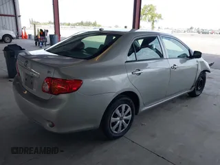 2010 Toyota Corolla with VIN JTDBU4EE2A9107184, listed as a IAAI auction lot 41861299 with 192,519 mi miles. Bid and sale history available at carsss.com. Image 4.