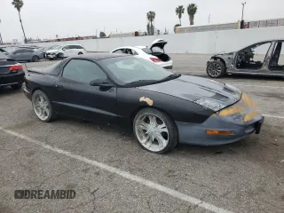 1995 Pontiac Firebird Firebird z VIN 2G2FS22S7S2241784, wystawiony jako Copart lot #53587895 z przebiegiem 218 211 mil mil oraz Czysty tytuł • Clean title. Historia ofert i sprzedaży dostępna na DreamBid. Obrazek 4.