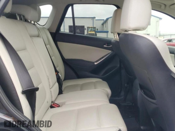 2016 Mazda CX-5 Grand Touring with VIN JM3KE4DY0G0727366, listed as a Copart auction lot 51682115 with 114,462 mi miles and Salvage Title. Bid and sale history available at carsss.com. Image 11.