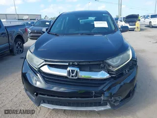 2017 Honda CR-V LX with VIN 7FARW5H33HE001050, listed as a IAAI auction lot 41944571 with 61,159 mi miles. Bid and sale history available at carsss.com. Image 12.
