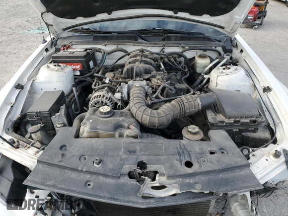 2007 Ford Mustang Deluxe z VIN 1ZVFT80N975326126, wystawiony jako Copart lot #53705085 z przebiegiem 77 431 mil mil oraz Szkoda całkowita • Salvage title. Historia ofert i sprzedaży dostępna na DreamBid. Obrazek 11.