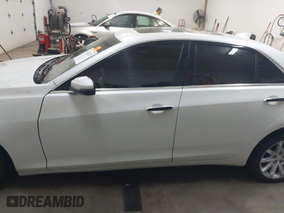 2015 Cadillac CTS Luxury AWD with VIN 1G6AX5SX5F0117267, listed as a IAAI auction lot 41762217 with 79,930 mi miles and . Bid and sale history available at DreamBid. Image 15.