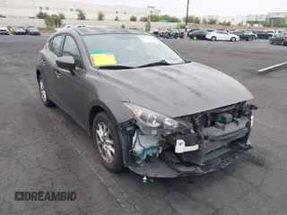 2015 Mazda 3 i Touring with VIN JM1BM1L7XF1261134, listed as a IAAI auction lot 42164554 with 130,570 mi miles and . Bid and sale history available at DreamBid. Image 1.