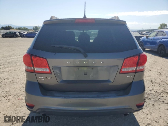 2012 Dodge Journey SXT z VIN 3C4PDDBG7CT300520, wystawiony jako Copart lot #66549985 z przebiegiem 114 954 mil mil oraz Czysty tytuł • Clean title. Historia ofert i sprzedaży dostępna na DreamBid. Obrazek 6.