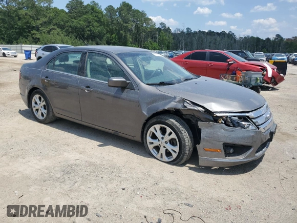2012 Ford Fusion SE z VIN 3FAHP0HA0CR328833, wystawiony jako Copart lot #57631955 z przebiegiem 94 613 mil mil oraz Szkoda całkowita • Salvage title. Historia ofert i sprzedaży dostępna na DreamBid. Obrazek 4.