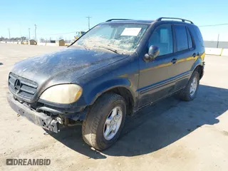 2001 Mercedes-Benz M-Class with VIN 4JGAB54E91A288934, listed as a IAAI auction lot 41714337 with 236,115 mi miles. Bid and sale history available at carsss.com. Image 2.