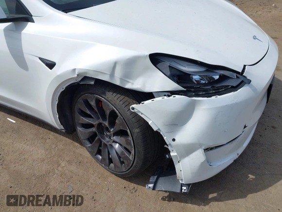 2021 Tesla Model Y Performance z VIN 5YJYGDEF7MF277769, wystawiony jako IAAI lot #42025157 z przebiegiem 28 522 mil mil oraz . Historia ofert i sprzedaży dostępna na DreamBid. Obrazek 6.