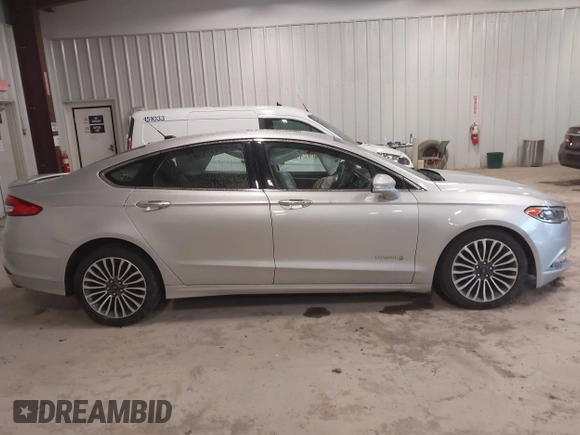 2018 Ford Fusion Titanium with VIN 3FA6P0RU9JR131818, listed as a IAAI auction lot 42442448 with 191,757 mi miles and . Bid and sale history available at DreamBid. Image 13.