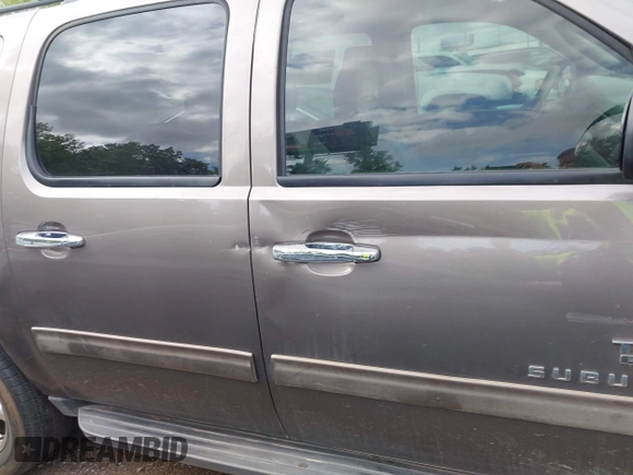 2011 Chevrolet Suburban LT with VIN 1GNSCJE03BR267184, listed as a IAAI auction lot 42156424 with 307,618 mi miles. Bid and sale history available at carsss.com. Image 13.