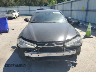 2018 Alfa Romeo Giulia Ti Lusso z VIN ZARFAEEN5J7566856, wystawiony jako Copart lot #52622205 z przebiegiem 68 656 mil mil oraz Szkody całkowita. Historia ofert i sprzedaży dostępna na DreamBid. Obrazek 5.
