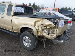 1999 Nissan Frontier XE z VIN 1N6ED26Y6XC307228, wystawiony jako IAAI lot #41804816 z przebiegiem 62 863 mil mil oraz . Historia ofert i sprzedaży dostępna na DreamBid. Obrazek 6.
