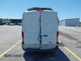 2017 Ford Transit Cargo z VIN 1FTYE1CM2HKB56212, wystawiony jako IAAI lot #42102063 z przebiegiem 174 769 mil mil oraz . Historia ofert i sprzedaży dostępna na DreamBid. Obrazek 16.