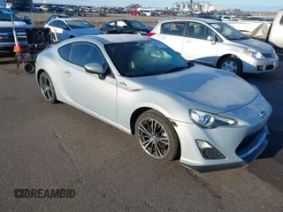 2013 Scion FR-S with VIN JF1ZNAA11D2730327, listed as a IAAI auction lot 41866644 with 79,394 mi miles. Bid and sale history available at carsss.com. Image 1.