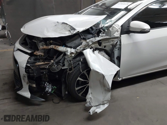 2017 Toyota Corolla L with VIN 5YFBURHE7HP693037, listed as a IAAI auction lot 42304020 with 117,710 mi miles and . Bid and sale history available at DreamBid. Image 6.