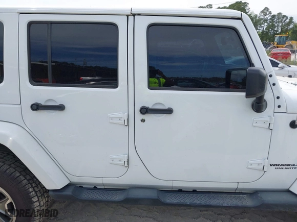 2015 Jeep Wrangler Unlimited Rubicon Hard Rock with VIN 1C4HJWFG7FL684057, listed as a IAAI auction lot 41963885 with 103,240 mi miles. Bid and sale history available at carsss.com. Image 13.