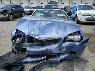 2005 Chrysler Crossfire Limited z VIN 1C3AN65L95X031875, wystawiony jako Copart lot #67713144 z przebiegiem 34 812 mil mil oraz Szkoda całkowita • Salvage title. Historia ofert i sprzedaży dostępna na DreamBid. Obrazek 5.