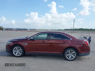 2015 Ford Taurus Limited with VIN 1FAHP2F85FG165586, listed as a IAAI auction lot 42565514 with 183,365 mi miles and . Bid and sale history available at DreamBid. Image 14.