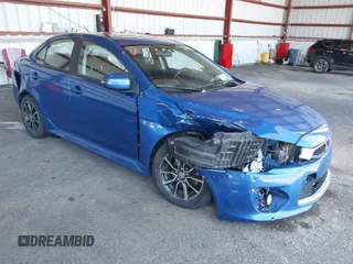 2017 Mitsubishi Lancer ES with VIN JA32V2FW5HU004856, listed as a IAAI auction lot 41950912 with 74,890 mi miles. Bid and sale history available at carsss.com. Image 1.