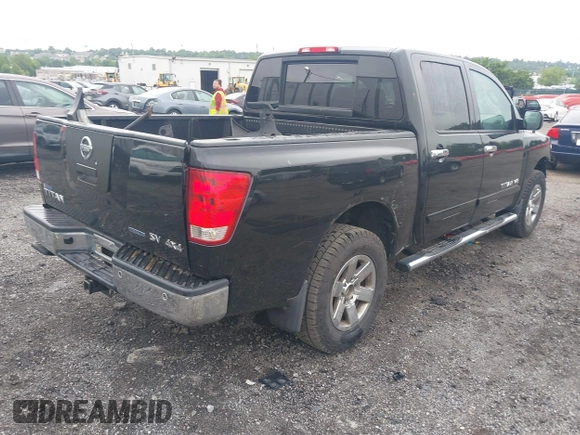 2011 Nissan Titan Pro-4X with VIN 1N6BA0ECXBN319157, listed as a IAAI auction lot 42456725 with 169,434 mi miles and . Bid and sale history available at DreamBid. Image 4.