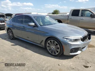 2020 BMW 5 Series with VIN WBAJB1C04LCD11871, listed as a Copart auction lot 66960324 with 4,850 mi miles and Salvage title. Bid and sale history available at DreamBid. Image 4.