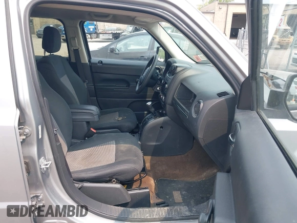2014 Jeep Patriot Sport z VIN 1C4NJPBA7ED799566, wystawiony jako IAAI lot #42424762 z przebiegiem 122 488 mil mil oraz . Historia ofert i sprzedaży dostępna na DreamBid. Obrazek 5.