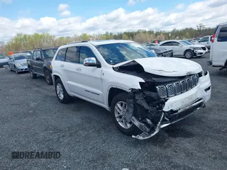 2017 Jeep Grand Cherokee Overland z VIN 1C4RJFCG6HC617770, wystawiony jako IAAI lot #42041810 z przebiegiem 119 125 mil mil oraz . Historia ofert i sprzedaży dostępna na DreamBid. Obrazek 1.