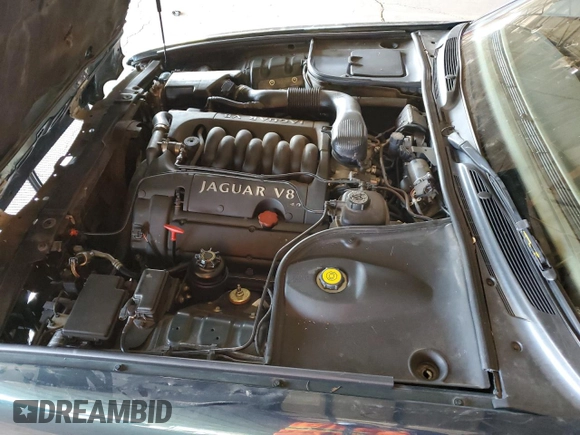 1999 Jaguar XJ with VIN SAJKX6046XC855872, listed as a Copart auction lot 47060465 with 65,286 mi miles and Clean title. Bid and sale history available at DreamBid. Image 11.
