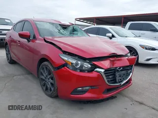 2018 Mazda 3 Touring with VIN 3MZBN1L37JM167604, listed as a IAAI auction lot 41623232 with 118,974 mi miles. Bid and sale history available at carsss.com. Image 1.