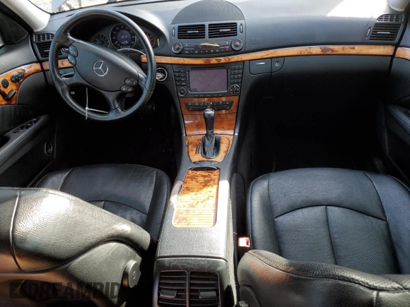 2007 Mercedes-Benz E-Class Sport 5.5L with VIN WDBUF72X27A992020, listed as a Copart auction lot 48470235 with 184,579 mi miles and Clean Title. Bid and sale history available at carsss.com. Image 8.