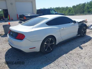 2018 Ford Mustang EcoBoost z VIN 1FA6P8TH2J5112959, wystawiony jako IAAI lot #42110990 z przebiegiem 97 088 mil mil oraz . Historia ofert i sprzedaży dostępna na DreamBid. Obrazek 4.