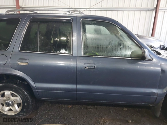 2002 Kia Sportage with VIN KNDJB723X25134499, listed as a IAAI auction lot 41273605 with 1 mi miles. Bid and sale history available at carsss.com. Image 12.