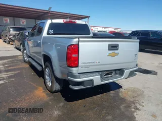 2018 Chevrolet Colorado 2WD LT с VIN 1GCGSCEN7J1143893, выставлен на аукционе IAAI как лот 42079057 с пробегом 72 351 миль миль и . История ставок и продаж доступна на DreamBid. Изображение 3.