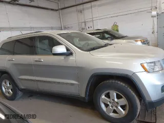 2011 Jeep Grand Cherokee Laredo with VIN 1J4RR4GG5BC690251, listed as a IAAI auction lot 41824839 with 261,010 mi miles. Bid and sale history available at carsss.com. Image 13.